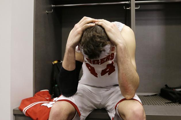 Wisconsin forward Frank Kaminsky reacts in the locker room after his team's 74-73 loss to Kentucky in an NCAA Final Four tournament college basketball semifinal game Saturday, April 5, 2014, in Arlington, Texas. (AP Photo/David J. Phillip)