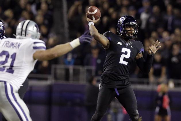 DTCU quarterback Trevone Boykin (2) passes as Kansas State linebacker Jonathan Truman (21) reaches in during the first quarter of an NCAA college football game Saturday, Nov. 8, 2014, in Fort Worth, Texas. (AP Photo/LM Otero)