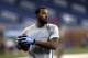 Detroit Lions wide receiver Calvin Johnson catches a ball during warmups before a NFL football game against the Miami Dolphins in Detroit Sunday, Nov. 9, 2014. (AP Photo/Paul Sancya)