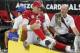 Arizona Cardinals quarterback Carson Palmer (3) leaves the field after injuring his left knee against the St. Louis Rams during the second half of an NFL football game, Sunday, Nov. 9, 2014, in Glendale, Ariz. (AP Photo/Rick Scuteri)