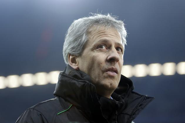 Moenchengladbach head coach Lucien Favre of Switzerland arrives the stadium prior to the German first division Bundesliga soccer match between FC Bayern Munich and Borussia Moenchengladbach, in Munich, southern Germany, Friday, Dec. 14, 2012. (AP Photo/Matthias Schrader)
