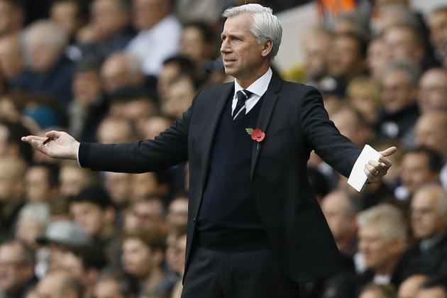 Newcastle's manager Alan Pardew holds out his hands as he watches his team play during the English Premier League soccer match between Tottenham Hotspur and Newcastle United at White Hart Lane stadium in London, Sunday, Oct. 26, 2014. (AP Photo/Kirsty Wigglesworth)