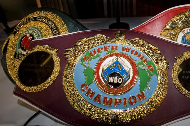 Die IBO, WBO und IBF Guertel liegen am Donnerstag, 16. April 2009 bei einer Pressekonferenz in der Veltins-Arena in Gelsenkirchen. Box-Weltmeister Wladimir Klitschko wird seine Titel der Verbaende WBO und IBF am 20. Juni in der Veltins-Arena auf Schalke gegen David Haye aus England verteidigen. Fuer den Boxkampf in der Fussball-Arena werden 60.000 Zuschauer erwartet. (AP Photo/Martin Meissner)--- The IBO, WBO and IBF belts of box champion Wladimir Klitschko are pictured at a press conference at the Veltins-Arena in Gelsenkirchen, Germany, Thursday, April 16, 2009. The Ukrainian heavyweight box champion Wladimir Klitschko will defend his WBO and IBF title against David Haye from England at the Veltins-Arena at Schalke in Gelsenkirchen, Germany, on June 20, 2009. About 60.000 spectators are expected for the fight at the soccer stadium. (AP Photo/Martin Meissner)