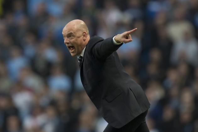 Wigan Athletic's manager Uwe Rosler issues instructions as his team beat Manchester City 2-1 during their English FA Cup quarterfinal soccer match at the Etihad Stadium, Manchester, England, Sunday March 9, 2014. (AP Photo/Jon Super)