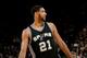 OAKLAND, CA - NOVEMBER 11: Tim Duncan #21 of the San Antonio Spurs stands on the court during a game against the Golden State Warriors on November 11, 2014 at Oracle Arena in Oakland, California. NOTE TO USER: User expressly acknowledges and agrees that, by downloading and or using this photograph, user is consenting to the terms and conditions of Getty Images License Agreement. Mandatory Copyright Notice: Copyright 2014 NBAE (Photo by Noah Graham/NBAE via Getty Images)