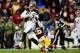 LANDOVER, MD - NOVEMBER 16: Wide receiver Mike Evans #13 of the Tampa Bay Buccaneers is tackled by cornerback Bashaud Breeland #26 of the Washington Redskins late in the third quarter at FedExField on November 16, 2014 in Landover, Maryland. (Photo by Patrick McDermott/Getty Images)