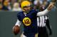 GREEN BAY, WI - NOVEMBER 16: Quarterback Aaron Rodgers #12 of the Green Bay Packers points while playing against the Philadelphia Eagles during the second quarter of the game at Lambeau Field on November 16, 2014 in Green Bay, Wisconsin. (Photo by Mike Zarrilli/Getty Images)