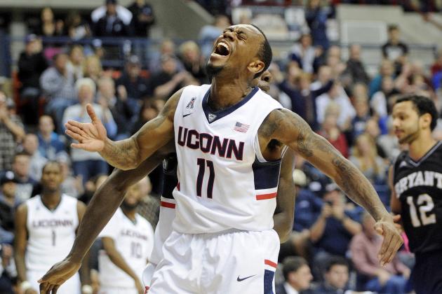 Connecticut's Ryan Boatright (11) celebrates during the second half of an NCAA college basketball game against Bryant in Storrs, Conn., on Friday, Nov. 14, 2014. Boatright scored 24 points in Connecticut's 66-53 victory. (AP Photo/Fred Beckham)