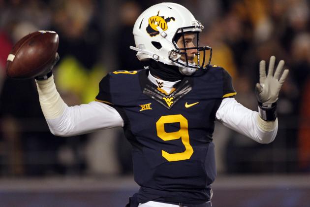 MORGANTOWN, WV - NOVEMBER 20:  Clint Trickett #9 of the West Virginia Mountaineers drops back to pass in the first half against the Kansas State Wildcats during the game on November 20, 2014 at Mountaineer Field in Morgantown, West Virginia.  (Photo by Justin K. Aller/Getty Images)