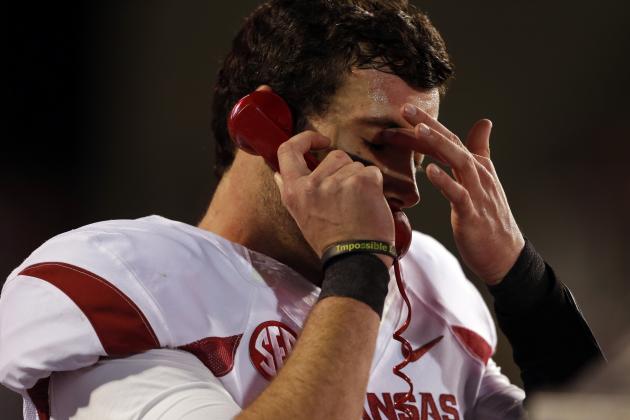 STARKVILLE, MS-NOVEMBER 1:  Brandon Allen #10 of the Arkansas Razorbacks talks on the phone in the second half at Davis Wade Stadium as they play against the Mississippi State Bulldogs on November 1, 2014, in Starkville, Mississippi. (Photo by Butch Dill/Getty Images)