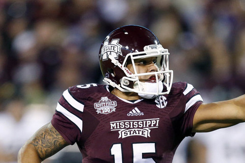 Mississippi State quarterback Dak Prescott (15) directs his blockers as he tries to find an open player in the first half of an NCAA college football game against Vanderbilt, Saturday, Nov. 22, 2014, in Starkville, Miss. (AP Photo/Rogelio V. Solis)
