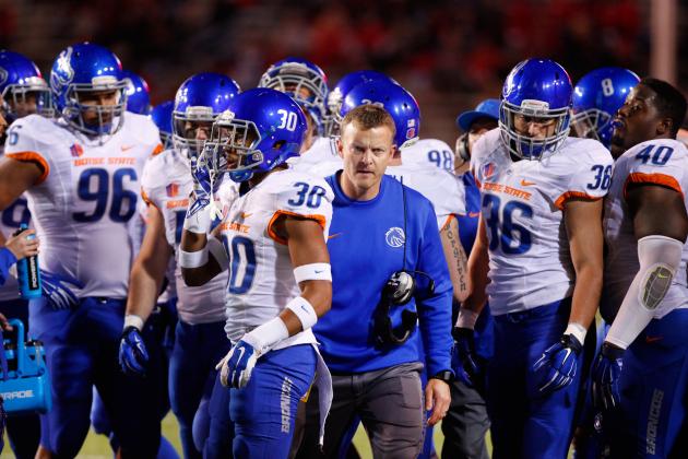 Boise State head football coach Bryan Harsin with his team against New Mexico during the second half of an NCAA college football game Saturday, Nov. 8, 2014 in Albuquerque, N.M. Boise State's won 60-49. (AP Photo/Eric Draper)
