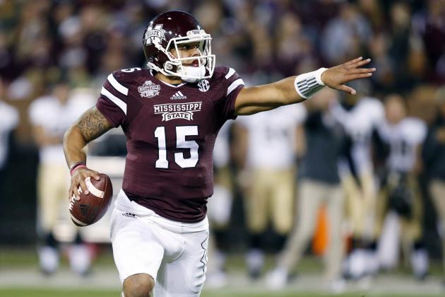 Mississippi State quarterback Dak Prescott (15) directs his blockers as he tries to find an open player in the first half of an NCAA college football game against Vanderbilt, Saturday, Nov. 22, 2014, in Starkville, Miss. (AP Photo/Rogelio V. Solis)