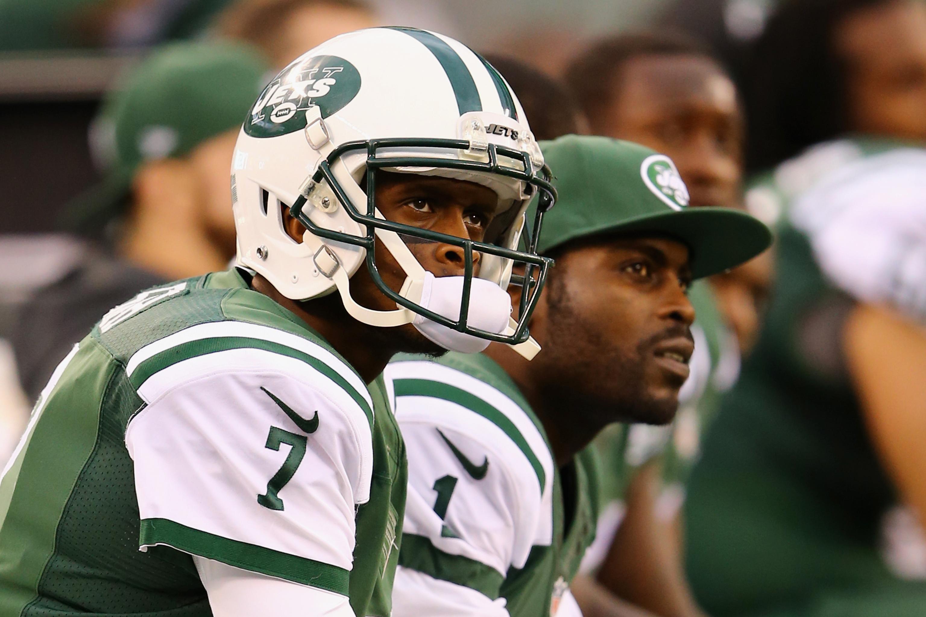 Quarterback Michael Vick of the New York Jets looks on against the News  Photo - Getty Images