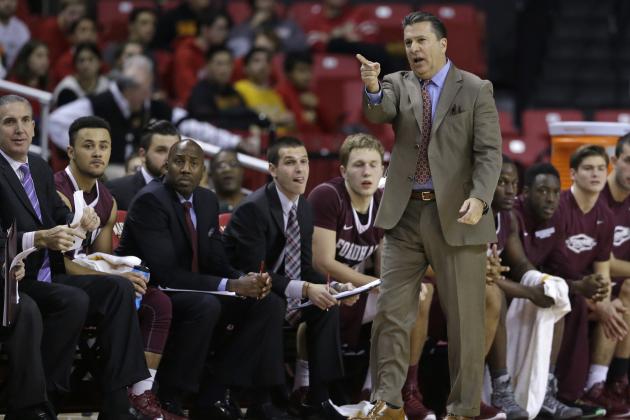 Fordham head coach Tom Pecora directs his players during an NCAA college basketball game against Maryland, Thursday, Nov. 20, 2014, in College Park, Md. (AP Photo/Patrick Semansky)