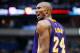 DALLAS, TX - NOVEMBER 21: Kobe Bryant #24 of the Los Angeles Lakers reacts to a call against the Dallas Mavericks in the third quarter at American Airlines Center on November 21, 2014 in Dallas, Texas. NOTE TO USER: User expressly acknowledges and agrees that, by downloading and or using this photograph, User is consenting to the terms and conditions of the Getty Images License Agreement. (Photo by Tom Pennington/Getty Images)