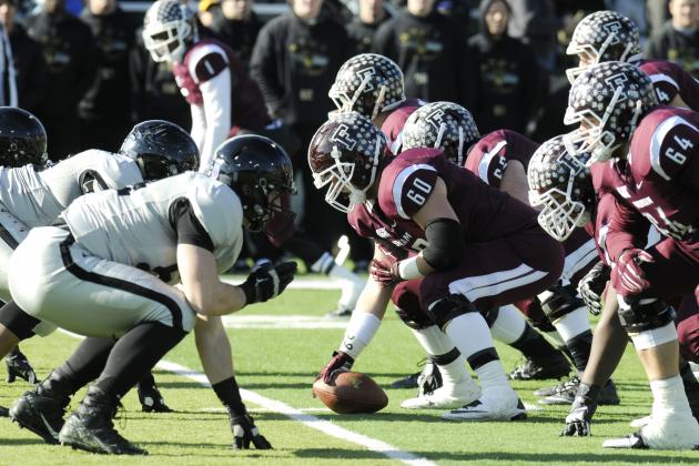 Fordham's offense lines up against Army during the first half of an NCAA college football game on Saturday, Nov. 22, 2014, in West Point, N.Y. (AP Photo/Hans Pennink)