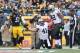 New Orleans Saints fullback Erik Lorig (41) celebrates with tight end Benjamin Watson (82) after making a catch and goes in for a touchdown in the second quarter of the NFL game , Sunday,Nov. 30, 2014 in Pittsburgh. (AP Photo/Don Wright)