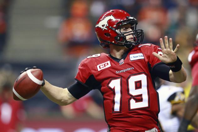 VANCOUVER, BC - NOVEMBER 30:  Bo Levi Mitchell #19 of the Calgary Stampeders throws a pass against the Hamilton Tiger-Cats during the 102nd Grey Cup Championship Game at BC Place November 30, 2014 in Vancouver, British Columbia, Canada.  (Photo by Jeff Vinnick/Getty Images)