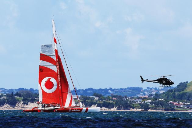 AUCKLAND, NEW ZEALAND - NOVEMBER 19: A view of Team Vodafone Sailing trimaran which is being remotely control by America's Cup skipper Jimmy Spithill as it races against a challenger catermeran in Auckland's Hauraki Gulf on November 19, 2014 in Auckland, New Zealand. Both catermeran are being controlled by Samsung GALAXY Note 4 smartphone remotely by the skippers who are in a helicopter above the boats. (Photo by Hannah Peters/Getty Images for Vodafone)