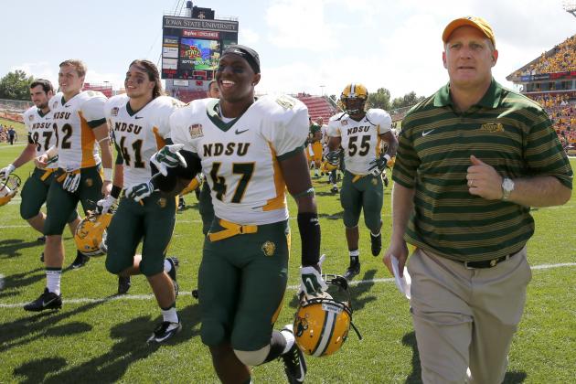 AMES, IA - AUGUST 30: Head coach Chris Klienman of the North Dakota State Bison leads his team off the field after the defeated the Iowa State Cyclones 34-14 at Jack Trice Stadium on August 30, 2014 in Ames, Iowa. North Dakota State defeated Iowa State 34-14. (Photo by David Purdy/Getty Images)
