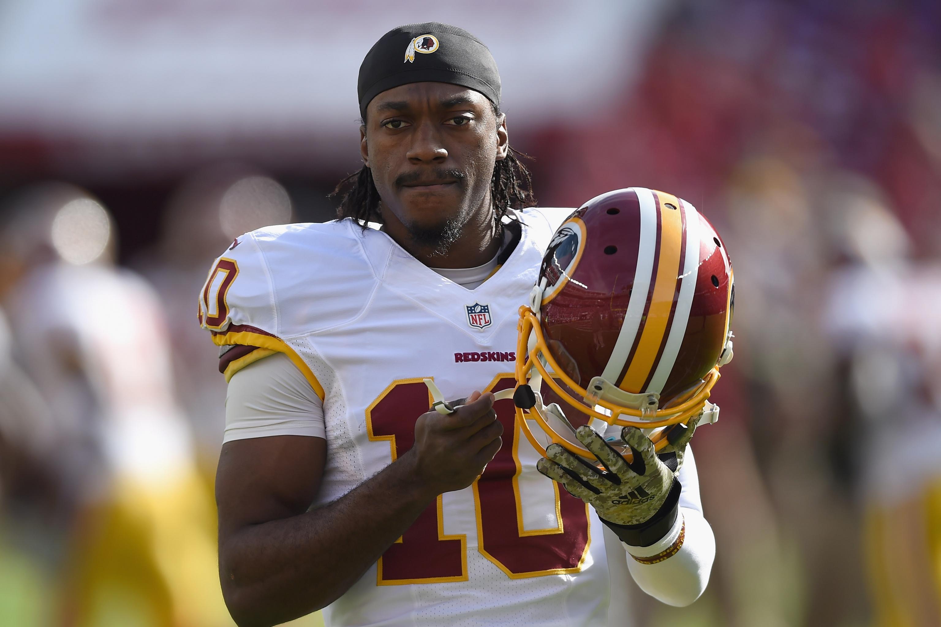 Former Redskin: RG3 could learn from Cowboys Tony Romo