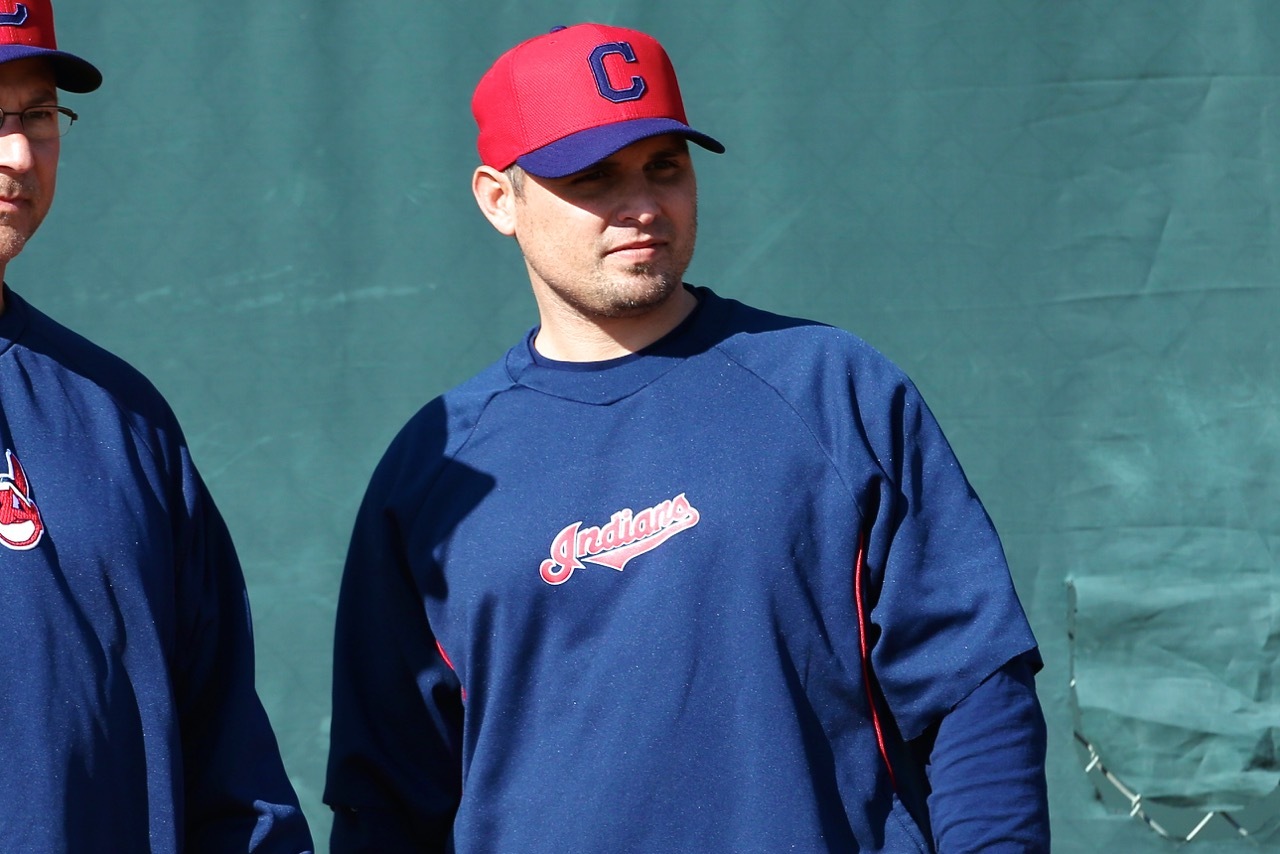 Tampa Bay Rays manager Kevin Cash, center, talks with catcher Mike