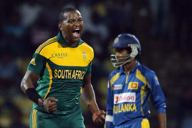 South Africa's Lonwabo Tsotsobe,  foreground, celebrates the dismissal of Sri Lanka's Kumar Sangakkara, unseen, during their third One Day International (ODI) cricket match in Pallekele, Sri Lanka, Friday, July 26, 2013. (AP Photo/Eranga Jayawardena)