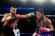 NEW YORK, NY - DECEMBER 06: David Lemieux hits Gabriel Rosado during a NABF MIddleweight title fight at the Barclays Center on December 6, 2014 in the Brooklyn Borough of New York City. (Photo by Alex Goodlett/Getty Images)