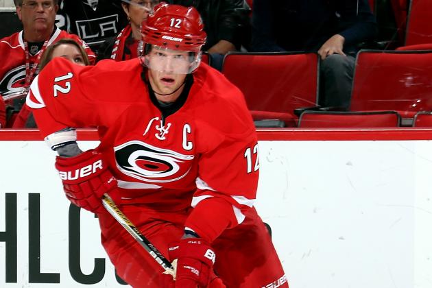 RALEIGH, NC - DECEMBER 04: Eric Staal#12 of the Carolina Hurricanes caries the puck during an NHL gae against the Washington Capitals at PNC Arena on December 4, 2014 in Raleigh, North Carolina.  (Photo by Gregg Forwerck/NHLI via Getty Images)