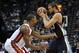 Miami Heat center Chris Bosh defends Memphis Grizzlies center Marc Gasol (33) in the second half of an NBA basketball game Sunday, Dec. 7, 2014, in Memphis, Tenn. The Grizzlies won 103-87. (AP Photo/Brandon Dill)
