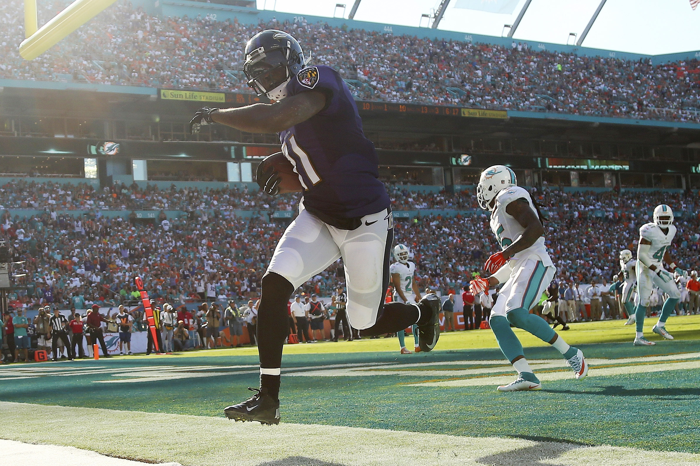 Before start of training camp, Ravens quarterback Joe Flacco worked with  receivers twice last week