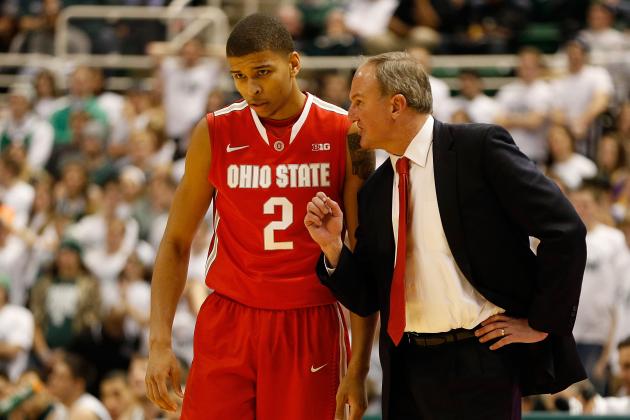 EAST LANSING, MI - JANUARY 07: Head coach Thad Matta talks with Marc Loving #2 of the Ohio State Buckeyes while playing the Michigan State Spartans at the Jack T. Breslin Student Events Center on January 7, 2014 in East Lansing, Michigan. Michigan State won the game 72-68 in overtime. (Photo by Gregory Shamus/Getty Images)