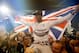 ABU DHABI, UNITED ARAB EMIRATES - NOVEMBER 23: Lewis Hamilton of Great Britain and Mercedes GP celebrates with his team after winning the World Championship after the Abu Dhabi Formula One Grand Prix at Yas Marina Circuit on November 23, 2014 in Abu Dhabi, United Arab Emirates. (Photo by Clive Rose/Getty Images)