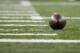 Football on the field during an NFL football game between the Detroit Lions and the Tampa Bay Buccaneers at Ford Field in Detroit, Sunday, Dec. 7, 2014. (AP Photo/Rick Osentoski)
