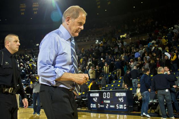 Michigan head coach John Beilein walks off the court after an NCAA college basketball game against Eastern Michigan at Crisler Center in Ann Arbor, Mich., Tuesday, Dec. 9, 2014. Eastern Michigan won 45-42. (AP Photo/Tony Ding)