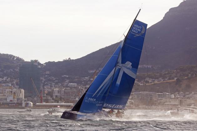 Team Vestas Wind departs on the next leg of the Volvo Ocean Race from the harbor in Cape Town, South Africa, Wednesday, Nov. 19, 2014. Boats in the Volvo Ocean Race fleet headed for one of the most testing legs of the event between South Africa and Abu Dhabi on Wednesday with the threat of tropical storms awaiting them in the Indian Ocean. (AP Photo/Schalk van Zuydam)
