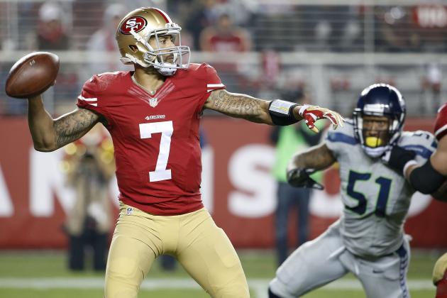 San Francisco 49ers quarterback Colin Kaepernick (7) passes against the Seattle Seahawks during the fourth quarter of an NFL football game in Santa Clara, Calif., Thursday, Nov. 27, 2014. (AP Photo/Tony Avelar)