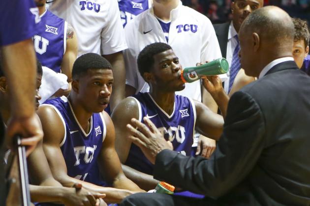 Dec 4, 2014; Oxford, MS, USA; TCU Horned Frogs head coach Trent Johnson talks with his team during a timeout during the game against the Mississippi Rebels at C.M. Tad Smith Coliseum. TCU Horned Frogs defeated the Mississippi Rebels 66-54.  Mandatory Credit: Spruce Derden-USA TODAY Sports