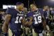 Navy quarterback Keenan Reynolds, right, celebrates with teammate John Hendrick after an NCAA college football game against Georgia Southern, Saturday, Nov. 15, 2014, in Annapolis, Md. Reynolds ran for six touchdowns to lead Navy over Georgia Southern 52-19. (AP Photo/Patrick Semansky)
