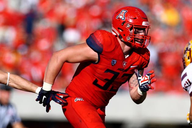 Nov 28, 2014; Tucson, AZ, USA; Arizona Wildcats linebacker Scooby Wright III (33) against the Arizona State Sun Devils during the 88th annual territorial cup at Arizona Stadium. The Wildcats defeated the Sun Devils 42-35 to win the Pac-12 south title. Mandatory Credit: Mark J. Rebilas-USA TODAY Sports