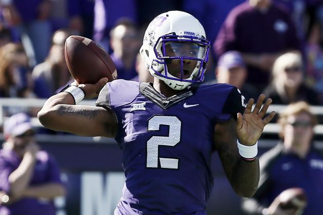 TCU quarterback Trevone Boykin (2) looks to throw to a receiver during the first half of an NCAA college football game against Iowa State at Amon G. Carter Stadium, Saturday, Dec. 6, 2014, in Fort Worth, Texas. (AP Photo/Brandon Wade)