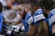 Detroit Lions center Dominic Raiola (51) on the sideline against the Minnesota Vikings during an NFL football game at Ford Field in Detroit, Sunday, Dec. 14, 2014. (AP Photo/Rick Osentoski)