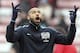 In this Saturday, Feb. 11, 2012 photo, Arsenal's Thierry Henry, is seen ahead of their English Premier League soccer match against Sunderland at the Stadium of Light, Sunderland, England. Henry has announced his retirement following a 20-year career. The 37-year-old Henry, a member of the France teams that won the 1998 World Cup and 2000 European Championship, will take up a media role as a consultant for Sky Sports channel. (AP Photo/Scott Heppell)