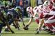 Arizona Cardinals and Seattle Seahawks players line up on the line of scrimmage in the first half of an NFL football game, Sunday, Nov. 23, 2014, in Seattle. (AP Photo/Stephen Brashear)