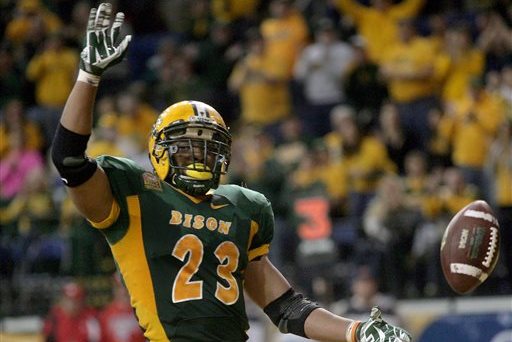 North Dakota State running back John Crockett celebrates after he scored a first-half touchdown against Youngstown State during an NCAA college football game Saturday, Nov. 22, 2014, in Fargo, N.D. (AP Photo/Bruce Crummy)