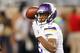 DETROIT, MI - DECEMBER 14: Teddy Bridgewater #5 of the Minnesota Vikings throws a first quarter pass against the Detroit Lions at Ford Field on December 14, 2014 in Detroit, Michigan. (Photo by Leon Halip/Getty Images)