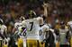 Pittsburgh Steelers quarterback Ben Roethlisberger (7) runs down the field in a hurry-up offense against the Atlanta Falcons during the first half of an NFL football game, Sunday, Dec. 14, 2014, in Atlanta. (AP Photo/Brynn Anderson )