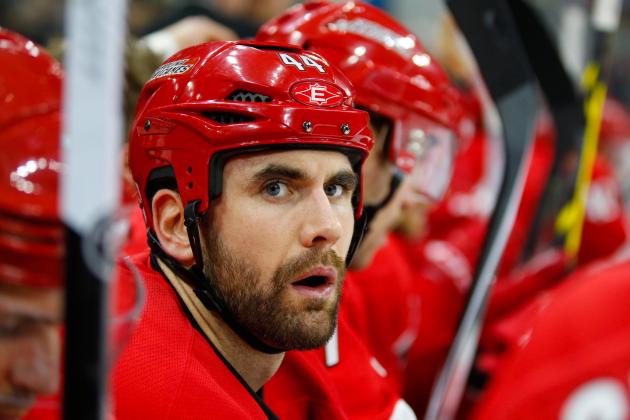 Nov 29, 2014; Raleigh, NC, USA; Carolina Hurricanes defensemen Jay Harrison (44) looks on from the bench against the Pittsburgh Penguins at PNC Arena. The Pittsburgh Penguins defeated the Carolina Hurricanes 3-2. Mandatory Credit: James Guillory-USA TODAY Sports