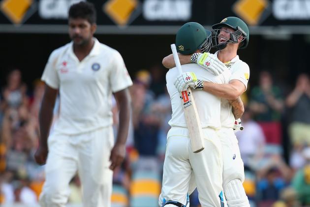 BRISBANE, AUSTRALIA - DECEMBER 20:  Mitch Marsh of Australia and Mitchell Johnson of Australia embrace as Marsh hits the winning runs to win the test during day four of the 2nd Test match between Australia and India at The Gabba on December 20, 2014 in Brisbane, Australia.  (Photo by Cameron Spencer/Getty Images)